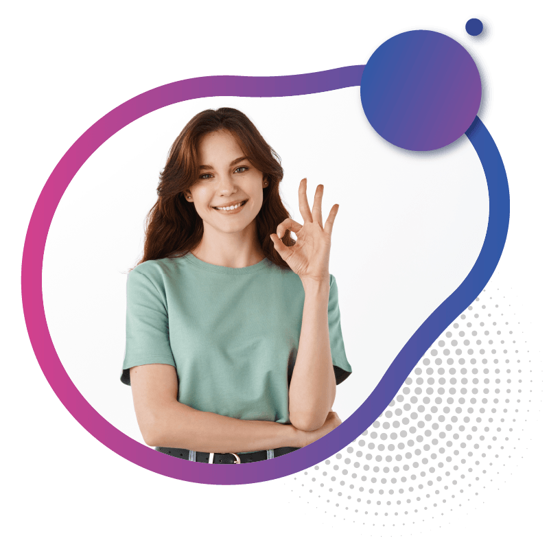 A woman in a mint green shirt makes an 'OK' hand gesture and poses confidently, symbolizing the ease of use and user-friendly experience of eSIM technology in Australia.